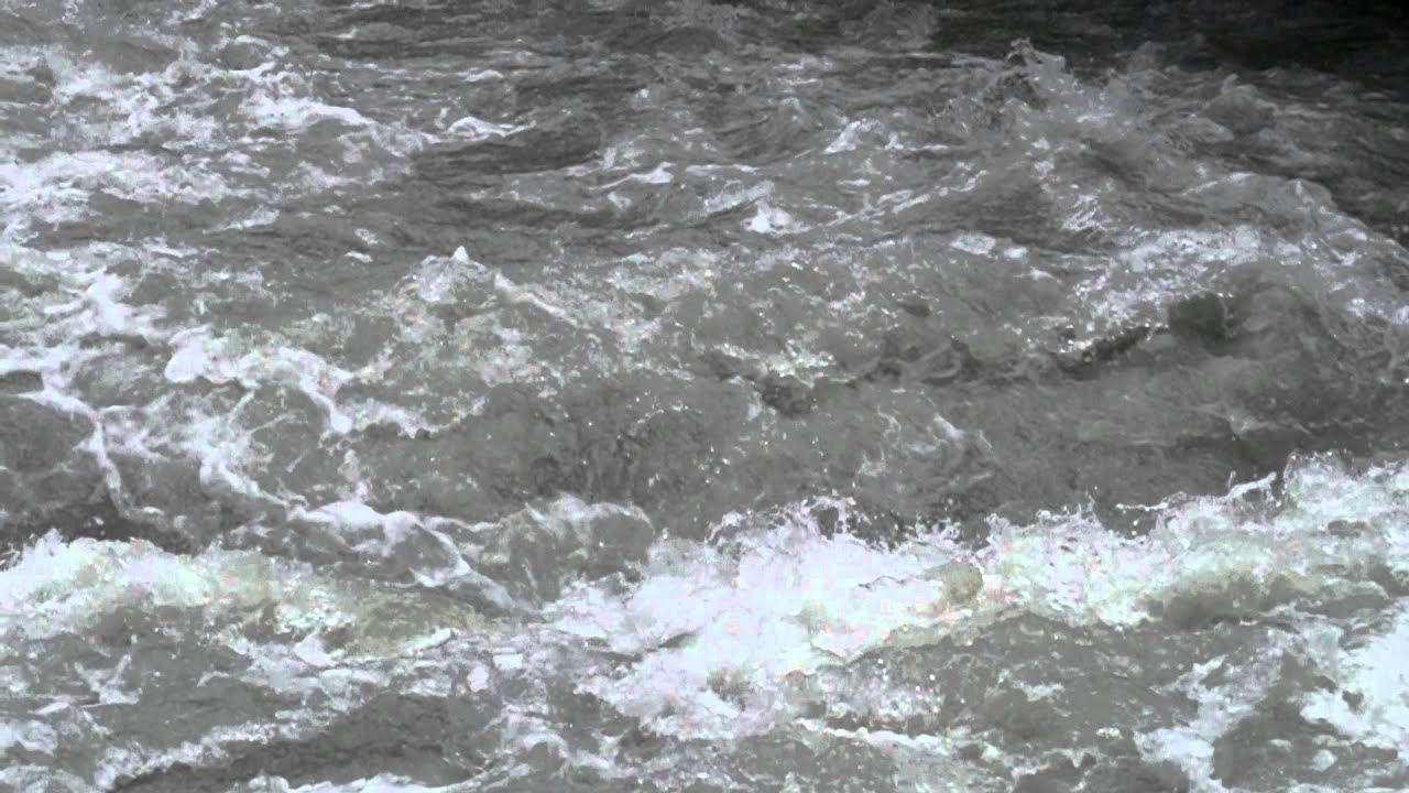 Slow motion shot of river waves - YouTube