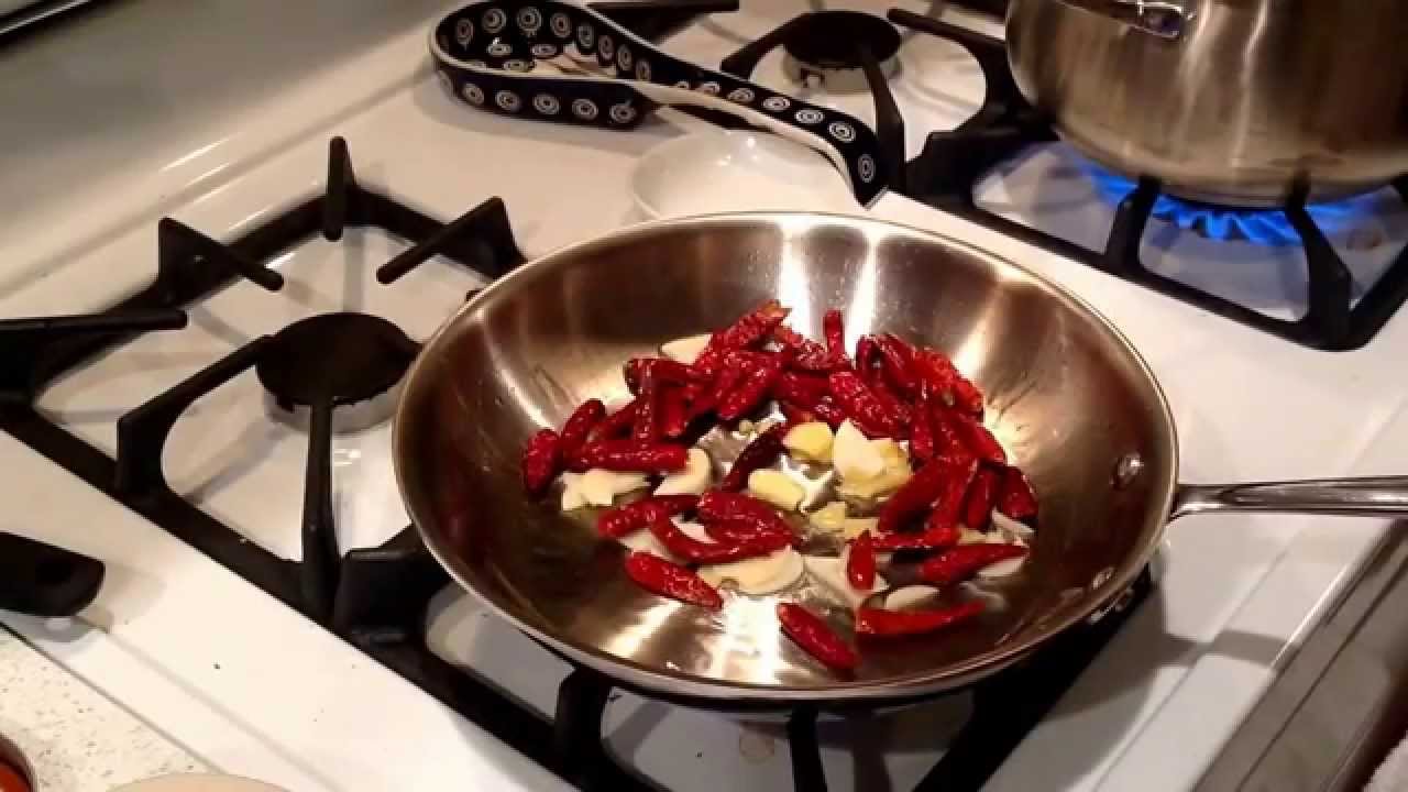 Szechuan Chicken Dry Pot with veggies and vermicelli noodles. Szechuan