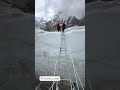 KhumbuIcefall using ladders is considered one of the most dangerous parts of climbing Mount Everest.