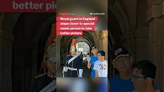 Royal guard in England steps closer to special needs person to take better picture