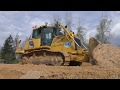 Komatsu D65EX-16 pushing sand part 1