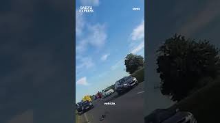 Motorcyclist loses control and narrowly avoids head on collision with oncoming traffic 😱  #news