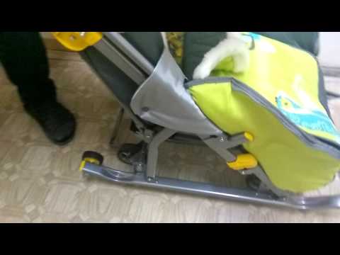 Санки-коляска "Ника детям 7-2. Коллаж-жираф" с колёсами Санки-коляска "Ника детям 7-2. Коллаж-жираф" с колёсами