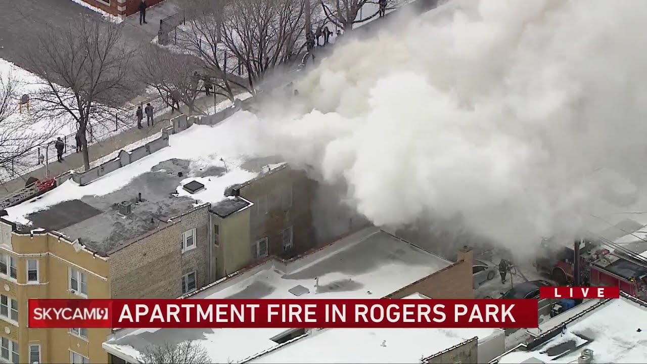 Emergency crews battle apartment fire on North Side - YouTube