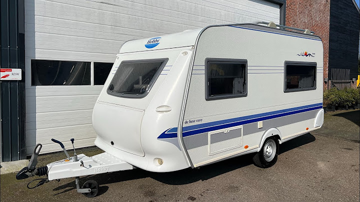 Hobby 400 De Luxe Easy Caravan + voortent | Caravan verkopen? Verkoop aan ons!