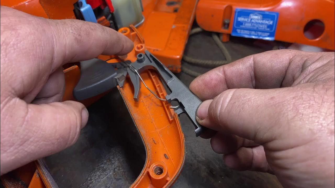 Husqvarna 455 chainsaw throttle trigger and lock out lever repair