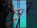Aerial silks inbetween high cliffs