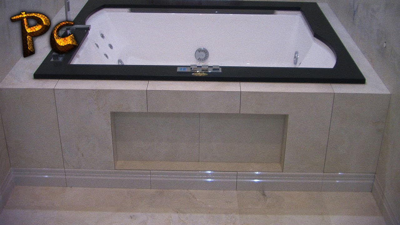 Installation of a sliding screen made of porcelain stoneware under a