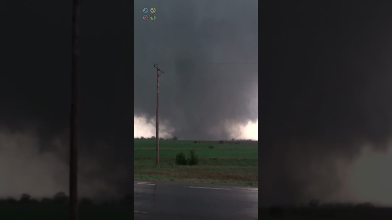 Car almost Drives into Tornado hidden in the rain