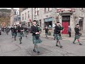 Ballater Pipe band lead the parade for the Remembrance Sunday 2021 service in Deeside, Scotland