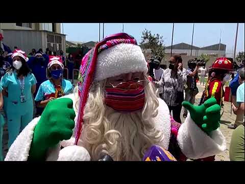 Santa visits sick children on fire truck in Peru