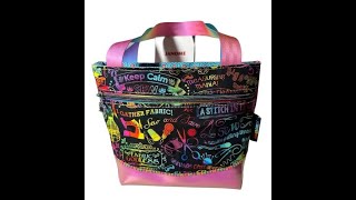 This cute mini tote bag is made in ONE hooping and includes a front zipper pocket!