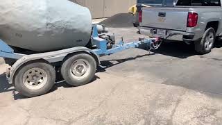 Pull-behind Concrete Mixer in the house!!  1 cubic yard short pour.