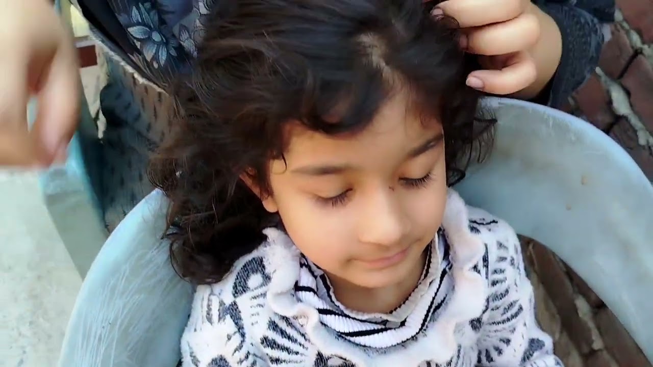 Hair checking of Ashna by mom