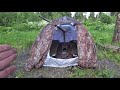 Печка и две раскладушки в палатке Спутник-3