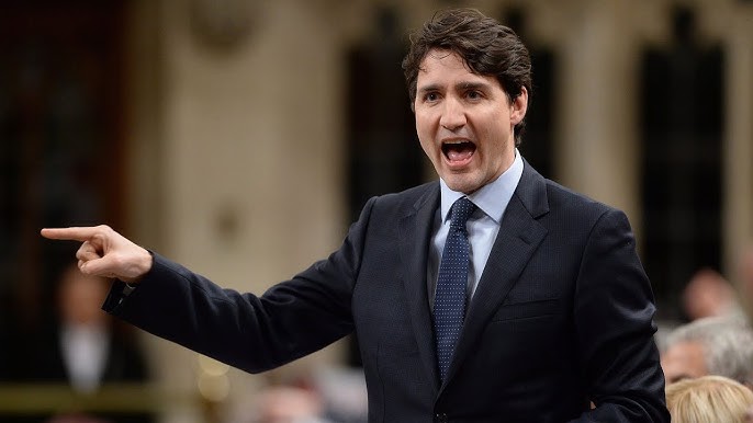 Trudeau and Scheer have fiery exchange on ethics, veterans - YouTube