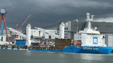 Submarine loading into cargo ship: TKMS submarine RSS INVINCIBLE loaded into Rolldock Star