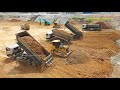 Wonderful Machinery Power Bulldozer Pushing Dirt in Mud Dump Trucks Hard Unloading Dirt