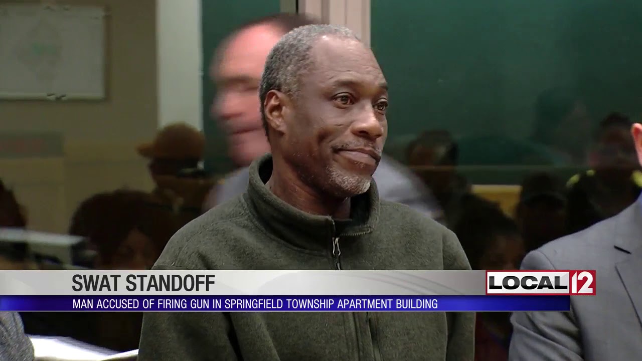 Man accused of firing gun in apartment building, sparking SWAT ...
