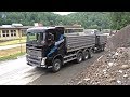 Man TGX and Volvo FH tridem unload stone