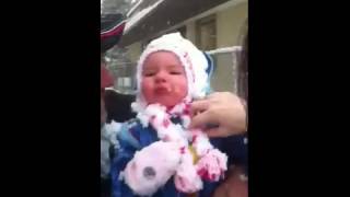 Man Sticks Young Girl In A Snow Covered Bush