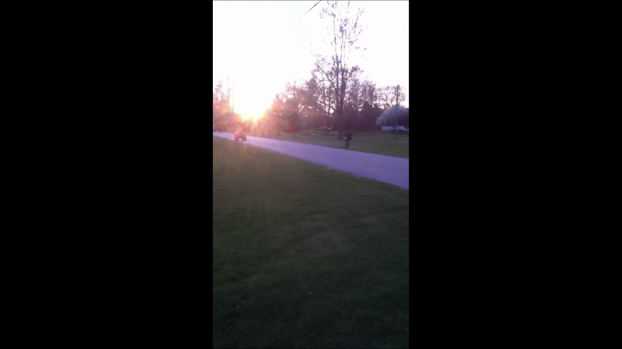 Me going full speed on my four-wheeler