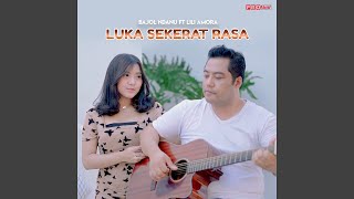 Luka Sekerat Rasa (feat. Lili Amora)