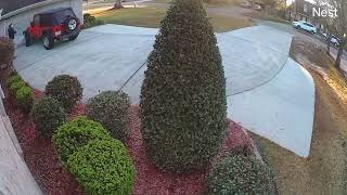 Guy crashes red Jeep Wrangler LJ into garage door (Security camera)