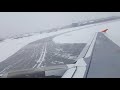 Взлёт из аэропорта Южно-Сахалинска сквозь снежную тучу