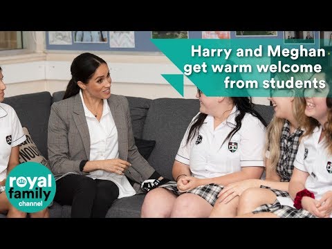 Prince Harry and Meghan get warm welcome from students