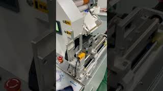 Wire folding labeling machine for applying labels to iPhone cases#labelingmachine #labeler