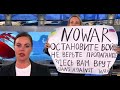 Девушка вбежала в студию прямого эфира Первого канала 14.03.22 с плакатом против войны в Украине