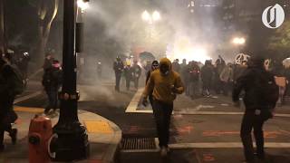 Police devices emit loud bangs and smoke during ninth day of Portland protests