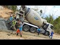 Extreme Concrete Paving On Steep Road By Hino 500 Ready Mix Cement Truck