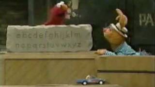 Elmo takes big bird's old role in mistaking the alphabet for a word
and sings classic tune that accompanies it. this is good when he
had...