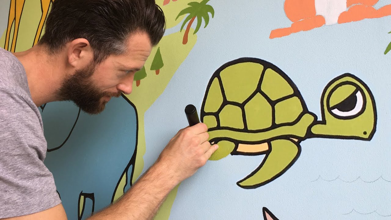 Mural for Sem – Kids bedroom wall with world map full of hand painted animals.