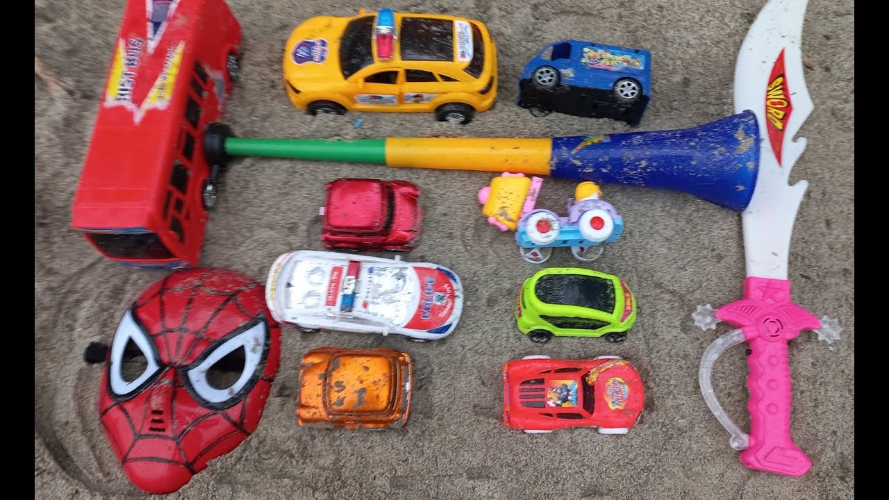 Looking for toys inside the sand field.
