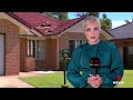 Police use a cherry picker to force a knife-wielding man off a Keperra home roof  | 7 News Australia