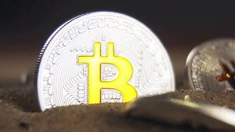 Bitcoins In Sand Stock Video