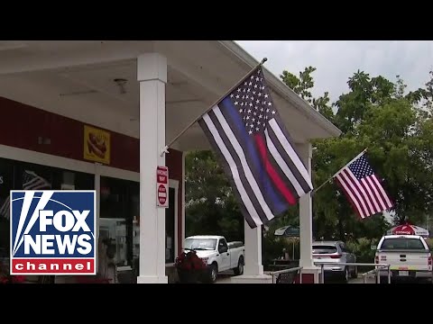 Restaurant owner fined for flying American flag