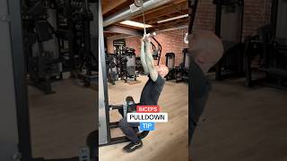 One simple body position change can make the biceps pulldown even more effective.