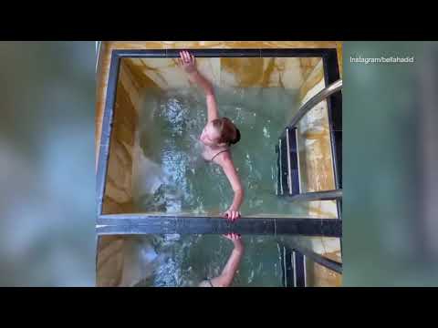 Video: A blonde Bella Hadid makes a splash on tropical holiday