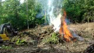 Volvo Excavator Burning Brush
