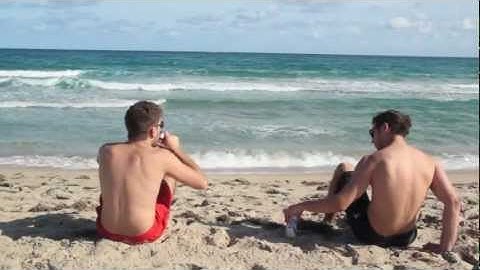Awkward Beach Encounter: When Strangers Share a Pabst Blue Ribbon Moment