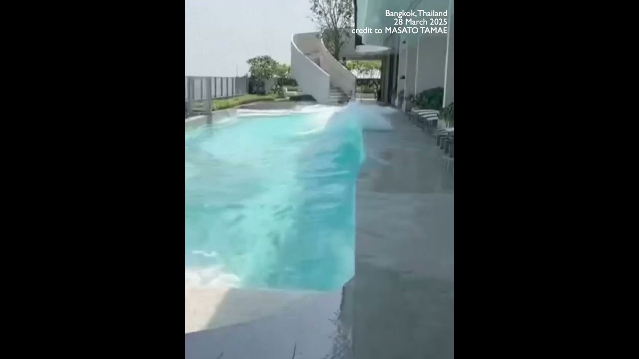 Water splashes out of Thailand high-rise pool during powerful earthquake