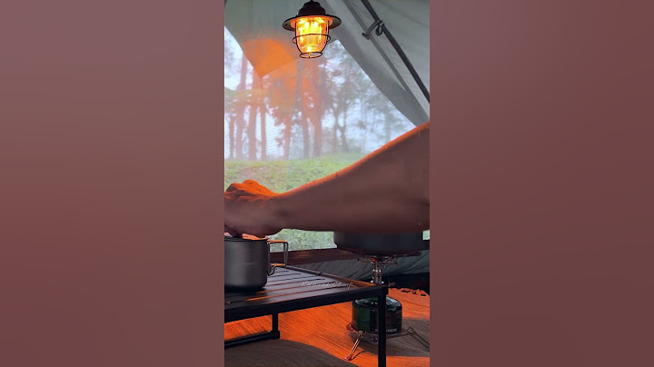 Enjoying heavy rain under the tent! Relaxing solo camping in the rain #campinginheavyrain #shorts