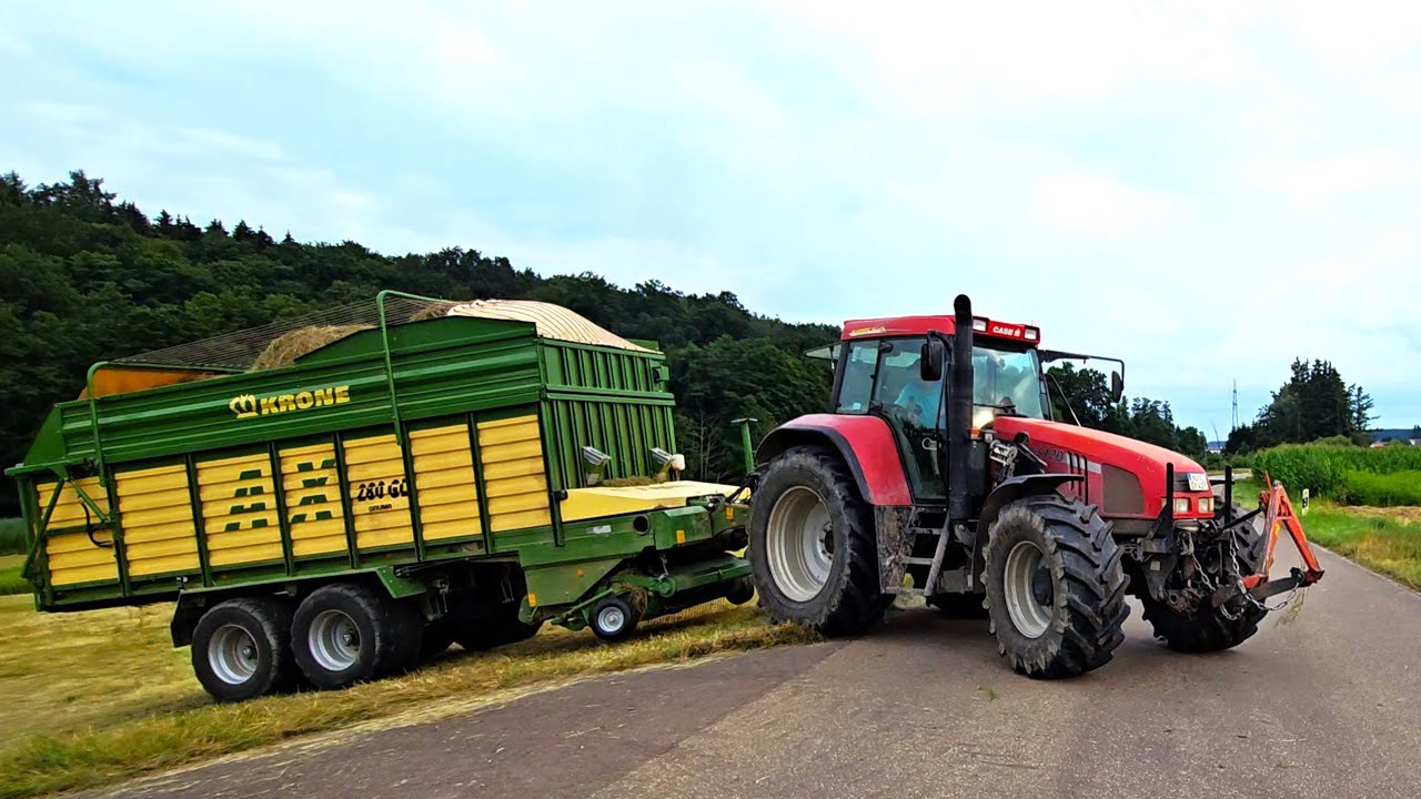 Case IH CS 120 mit Krone AX 280 GL Ladewagen beim Heu aufladen!