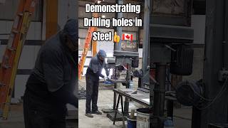 Demonstrating Drilling Holes in Steel