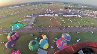 Inflation and launch of hot air balloons at the sun-n-fun show in
lakeland, florida. music is op 71 "waltz flowers" from "the
nutcracker" by piotr...