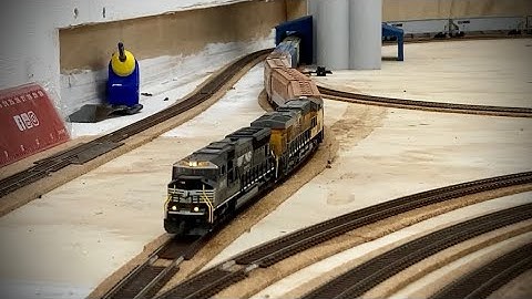 N scale layout update. Scenery, new industry area and bad clothes.